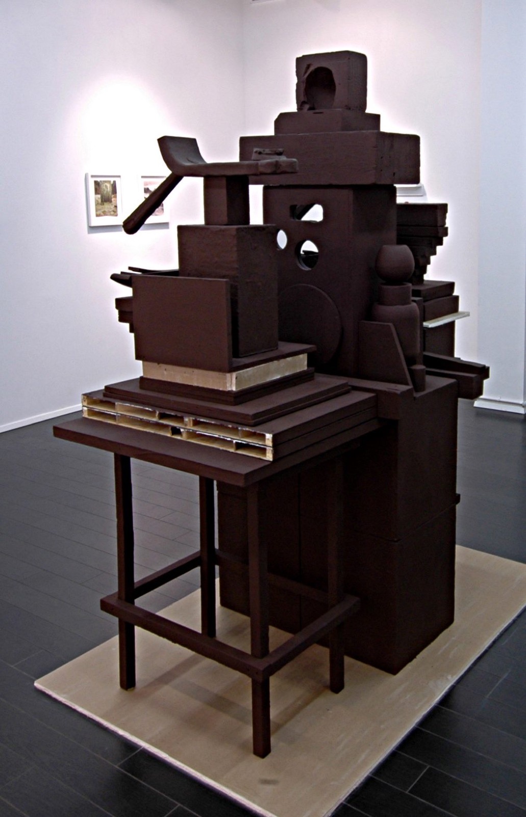 Contents of studio gathered, painted brown, arranged